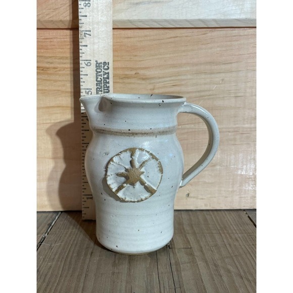 Small Pottery Pitcher with handle. 5" tall. Sand dollar? Signed. - Picture 3 of 4